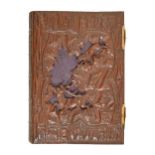 A photograph album with Swiss carved walnut boards, c1900,  that to the cover with stag and hound in