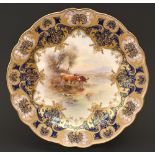 A Royal Worcester plate, 1916, painted by H Stinton, signed, with cattle in blue and gilt border and