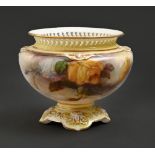 A Royal Worcester vase, 1905, with reticulated rim and painted with Hadley roses between shaded