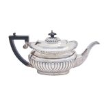 A George V silver teapot with gadrooned rim,  14cm h, by C S Harris & Sons Ltd, London 1917, 21ozs