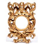 An Italian giltwood miniature frame, 19th c, in rococo style, carved with papal tiara and the Keys