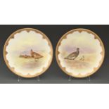 A pair of Royal Doulton bone china dessert places, c1913,  painted by J Hancock, both signed, with