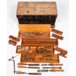 A tool chest and miscellaneous woodworking tools, early 20th c, the interior with lidded compartment