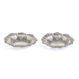 A pair of Edwardian die stamped silver bonbon dishes, 11cm l, by Alfred Everington, Chester 1902,