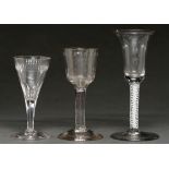 An English wine glass, c1770, the fluted ogee bowl with engraved and cut polished border, on plain