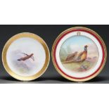 A Cauldon bone china plate, early 20th c, painted by J E Dean, signed, with pheasants, in claret and