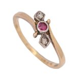 A three stone ruby and diamond ring, in 18ct gold, marks rubbed, 1.9g, size J Setting worn