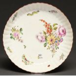 An English-decorated Chinese porcelain saucer-dish, c1760, finely painted in Meissen style with a