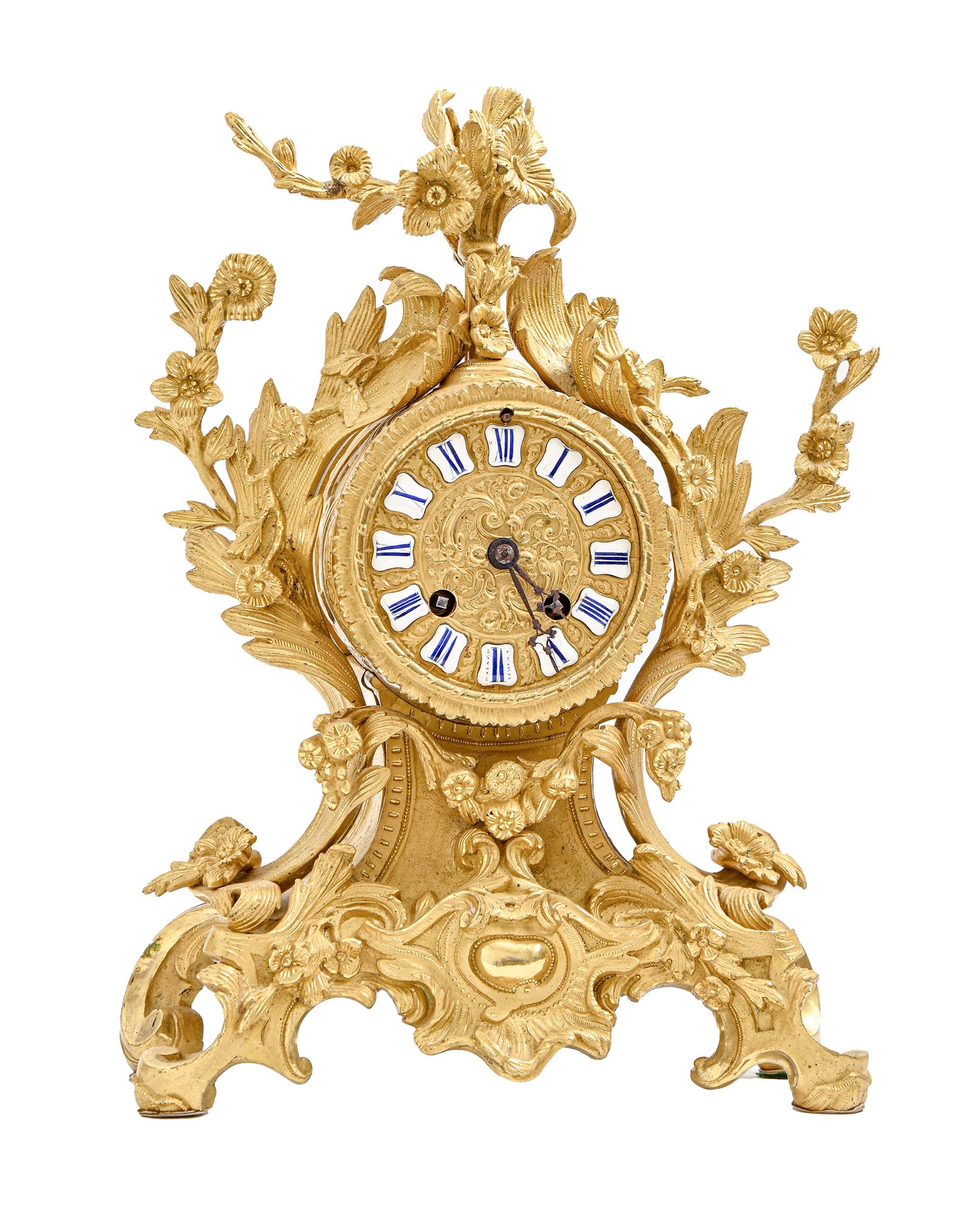 A French gilt brass mantel clock, third quarter 19th c, the drum cased bell striking movement with
