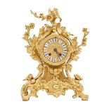 A French gilt brass mantel clock, third quarter 19th c, the drum cased bell striking movement with