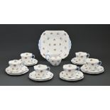 A Shelley bone china tea service, mid 20th c, Dainty shape, decorated with scattered flowers, red