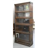 An oak sectional bookcase, Globe-Wernicke Co Ltd, early 20th c, 189cm h; 86cm l Metal parts with