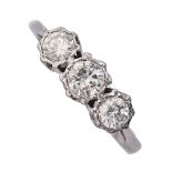 A three stone diamond ring, with round brilliant cut diamonds, in white gold marked 18ct PLAT, 2.8g,