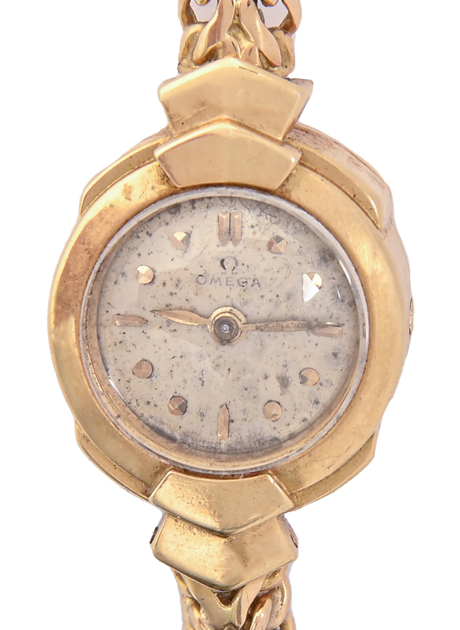 An Omega 18ct gold lady’s wristwatch, No 12079522, calibre 212 movement, 17mm, Denison case,