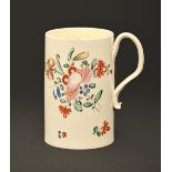 A creamware mug, Yorkshire or Staffordshire, c1780, of plain cylindrical shape, enamelled with