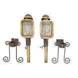 A pair of Victorian black painted sheet iron and brass carriage lamps, 45cm h, converted to