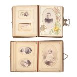 Two Victorian albums of contemporary cartes de visite and cabinet portraits, various, mainly