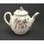 A Worcester teapot and cover, c1765, painted in bright enamels with flowers, the handle picked out