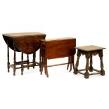 A mahogany Sutherland table, 65cm h, an oak gateleg table on turned legs and an oak stool, 50cm h (