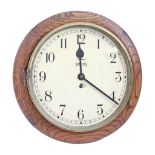 A Smith's oak eight day wall clock, with painted dial, 40cm diam Hinge on dial broken and