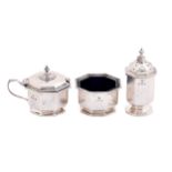 A George V silver condiment set,  octagonal, pepperette 82mm, by William Neale Ltd, Birmingham 1928,