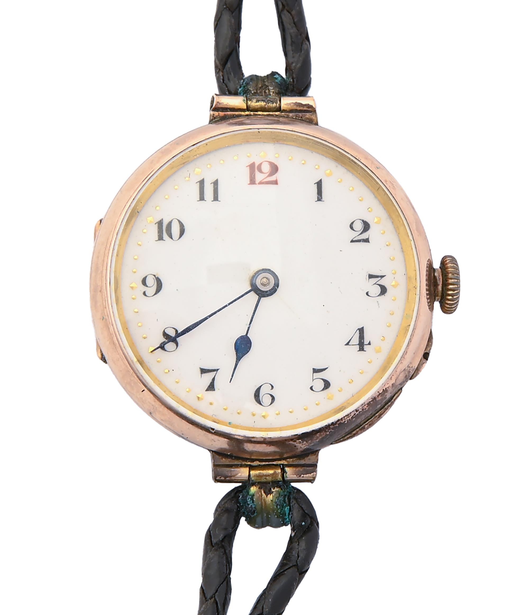 A 9ct gold lady’s wristwatch, 26mm diam, import marked London 1934, leather strap, 19.5g Working