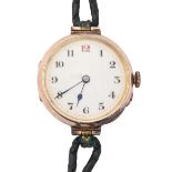 A 9ct gold lady’s wristwatch, 26mm diam, import marked London 1934, leather strap, 19.5g Working
