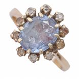 A blue and white paste cluster ring, in gold marked 9ct, 4.9g, size O Blue paste chipped, several of