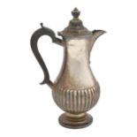 A George V silver lidded baluster jug, 26cm h, by Martin, Hall & Co Ltd, Sheffield 1919, 14ozs