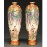 A pair of Japanese Satsuma slender oviform vases, by Kazan, Meiji period, decorated with young women