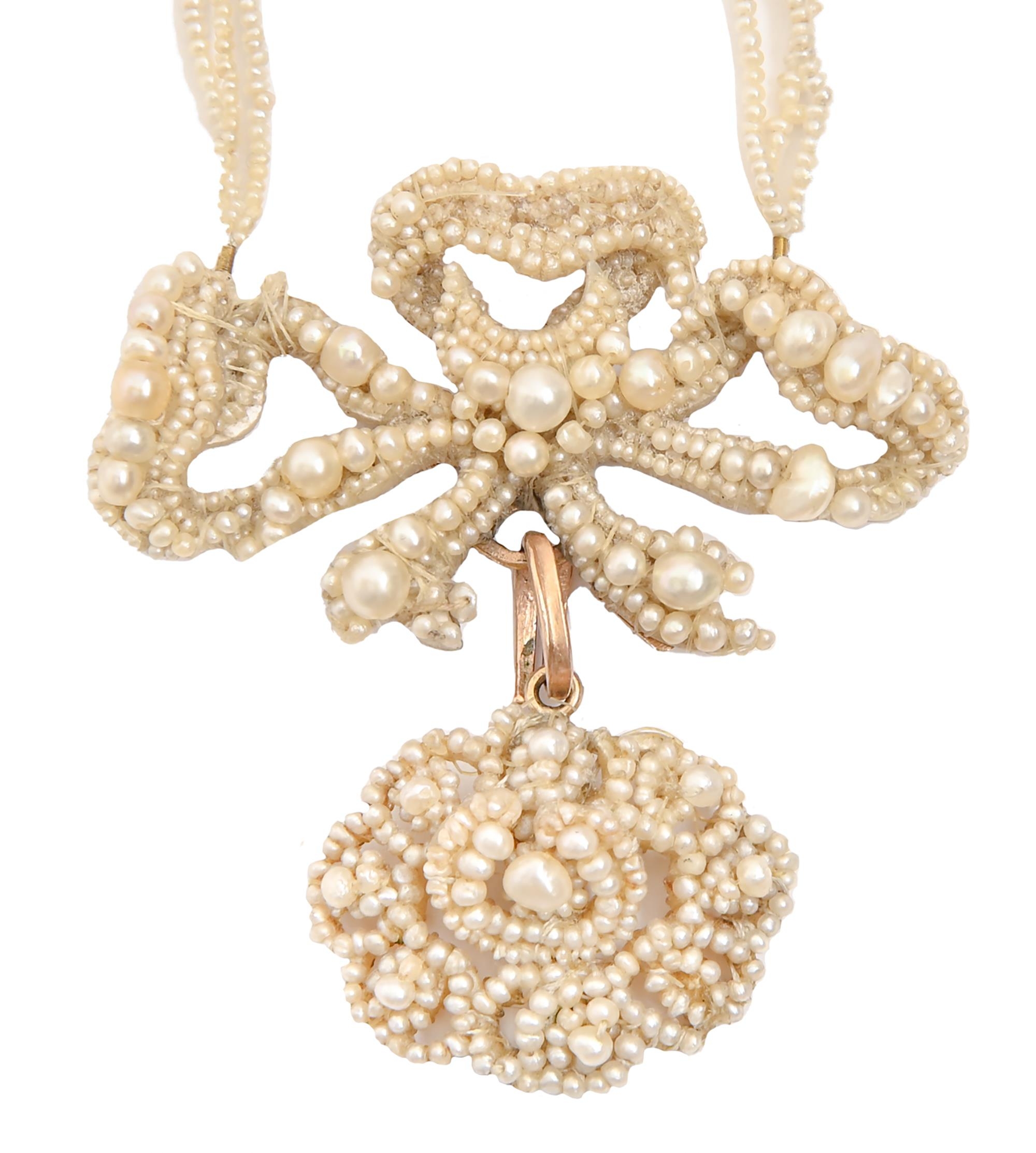 A seed pearl necklace, c1830, in the form of a bow and floral pendant, on gold wire armature