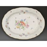 A Meissen dish, 19th c, painted with a loose bouquet in New Brandenstein moulded border, scattered