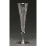 An English ale glass, c1780, the plain conical bowl on solid stem and plain foot, 18cm h Good