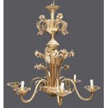 A Venetian glass chandelier, mid 20th c, of amber-gold glass, with swan necked reeded branches and