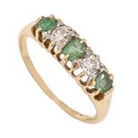 An emerald and diamond ring, in gold marked 18, 3.5g, size N Good condition