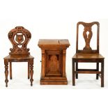 A Victorian carved oak hall chair, a George III oak side chair with boarded seat and a small oak