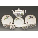 A Minton tea service, early 20th c, painted with birds on branches and insects, by J E Dean, each