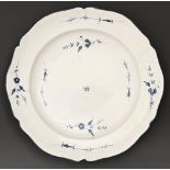 A Chantilly blue and white dish, late 18th c, painted with the Sprig pattern, 29.5cm diam, painted