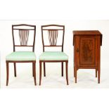 A pair of Edwardian mahogany chairs, on slender reeded square tapering legs, rail stamped 1288/00