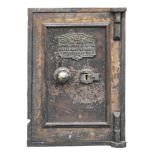 A late Victorian or Edwardian iron safe, C Price & Co Wolverhampton, with drawer, brass knob, key,