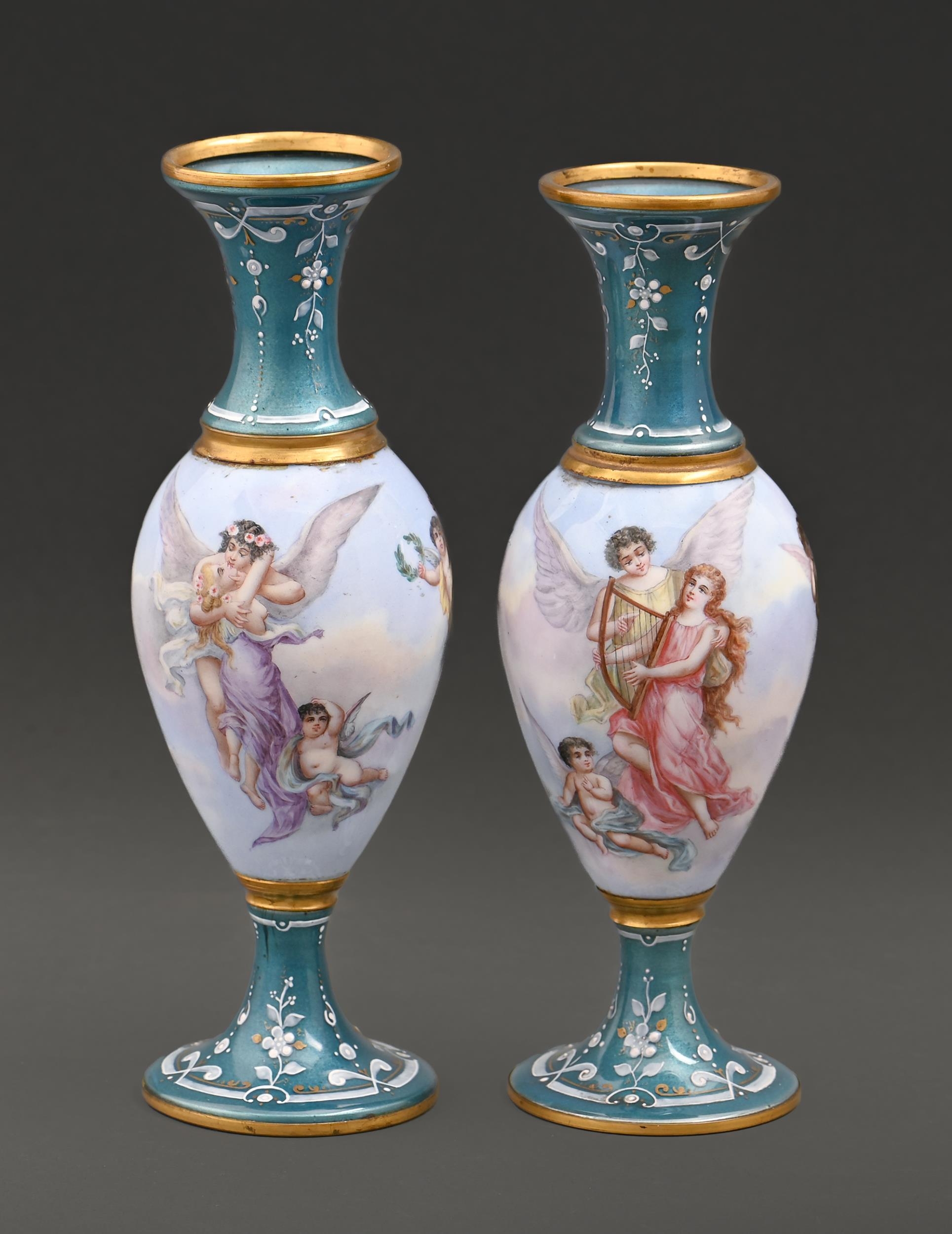 A pair of French enamel vases, early 20th c, painted with Venus and Cupid in the sky, between teal