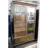 A Scottish mahogany wardrobe, early 20th c, with secessionist style brass handles, 211cm h; 131cm l,