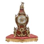 A French gilt lacquered brass mounted red lacquered mantel clock, late 19th c, in Louis XV style,