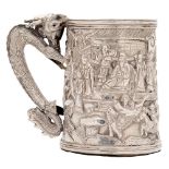 A Chinese silver repousse mug, 19th c,  with dragon handle, 83mm h, marked HC, 4ozs 16dwts Minor