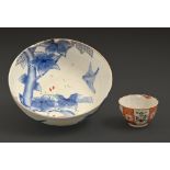 A Japanese porcelain bowl, Meiji period, painted in underglaze blue and overglaze enamels with birds