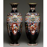 A pair of Japanese cloisonne enamel vases, Meiji period, decorated with lappets on a midnight blue