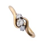 A three-stone diamond ring, gold hoop marked 18ct & PLAT, 2.8g, size J Good condition