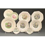 Nine Swansea and other British earthenware moulded children's plates,  one printed in green and red,