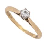 A diamond solitaire ring, in gold marked 18ct, 2.4g, size L Light wear