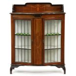A mahogany and inlaid china cabinet, c1910, with leaded glass doors, 139cm h; 106cm l Top